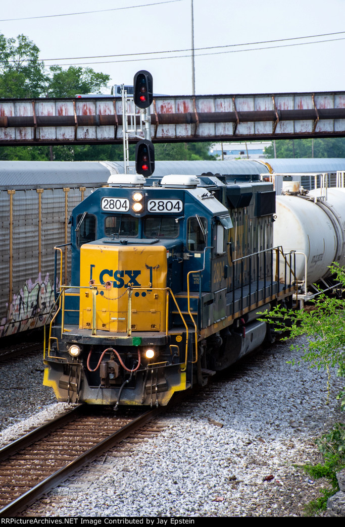 CSX 2804 pulls a local by NS' DeButts Yard 